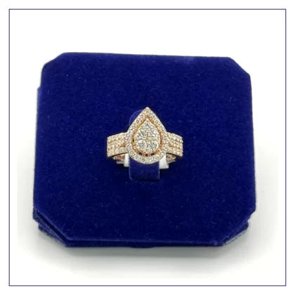 14K rose gold pear shaped ring with card